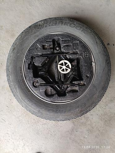 5 110: Комплект для запаски автомобиля: - Литой алюминиевый диск R16, 5 — 7