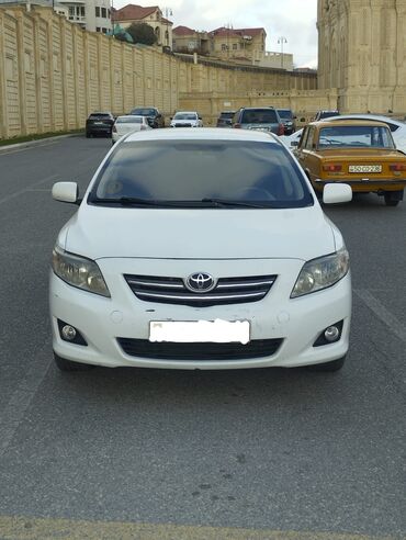 Toyota: Toyota Corolla: 1.6 l | 2006 il Sedan — 1
