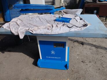 Оборудование для бизнеса: Утюжный Гладильный стол с подогревом и турбонаддувом состоянии новый