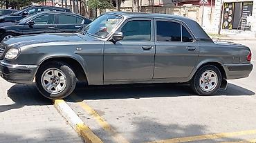 volga 2110: GAZ Volga 31105 sedan - Kuzov: 4 qapılı sedan, tünd boz rəng, xrom ön — 4