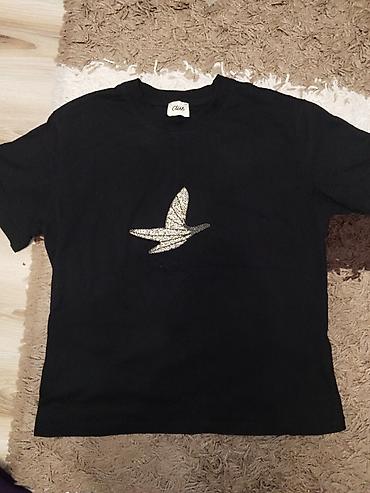 nike tech flecce: Футболка черная с серебристым аппликационным рисунком птицы по центру — 1