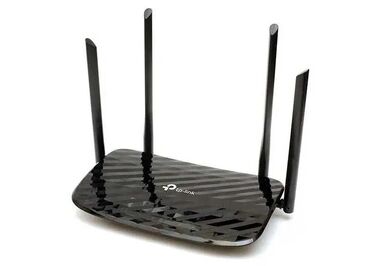 Modemlər və şəbəkə avadanlıqları: TP-Link şirkətindən olan bu qara rəngli router, ev və ya ofis