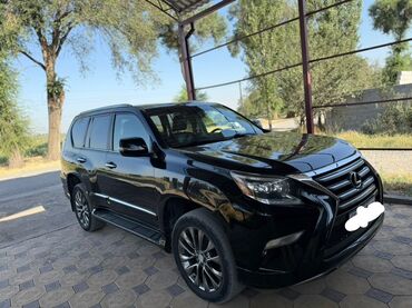 фары нексия 2: Черный внедорожник Lexus GX, модель 2021 года, оснащенный широкой