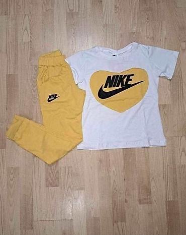 nike suknja: Ženski sportski komplet majica i donji deo trenerke sa dzepovima. Bela — 5