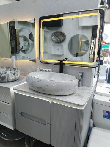 hamam ucun sushilka: Mərmər effektli, oval formalı əl yumaq üçün lavabo. Ağ rəngdə olan bu