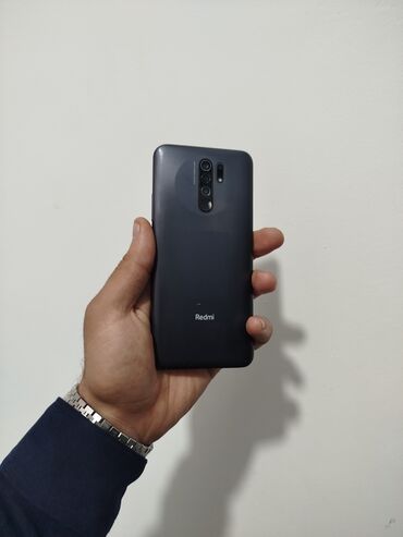 daxili kredit telefonlar: Xiaomi Redmi 9, 64 GB, rəng - Boz, 
 Düyməli, Barmaq izi, İki sim kartlı