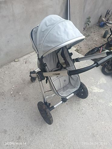 коляска для детей: Unvan pirsagi sekilde gorunduyu kimidi. oturaq ve uzanaq veziyyetde — 1