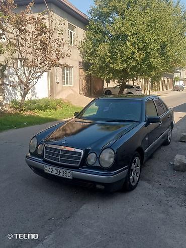 Mercedes-Benz: Mercedes-Benz E-Class: 2.3 l | 1995 il Sedan — 1