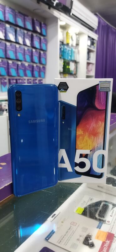 samsung gt e1310: Samsung Galaxy A50, 64 ГБ, цвет - Синий, Гарантия, Отпечаток пальца, Две SIM карты