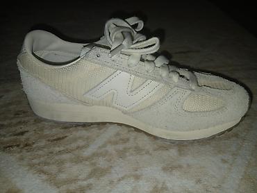 Кроссовки и спортивная обувь: Bej rəngli New balance U471
istifade Olunmayıb — 1