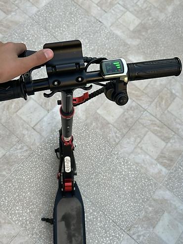 Электротранспорт: Elektrik skuter – qatlana bilən, şəhər içi rahat hərəkət üçün. Bu — 9