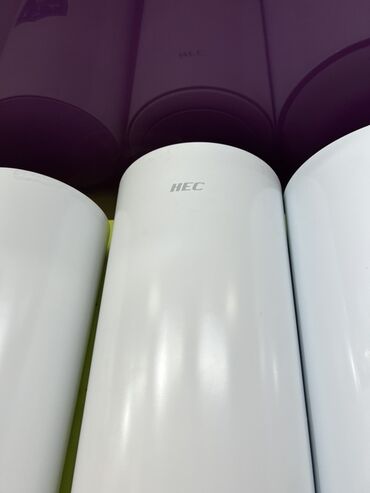 гбо баллоны: Водонагреватель HEC с цилиндрическим корпусом белого цвета. Компактный