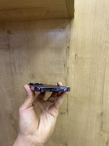 mini 3 pro: IPhone 14 Pro в фирменном тёмно-фиолетовом цвете. Смартфон с плоскими — 3
