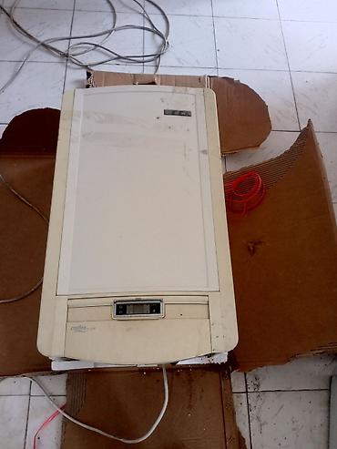irsad electronics sobalar: İsti su və isitmə üçün qaz kombi - Model: Confeo U 23 (ön paneldə — 2
