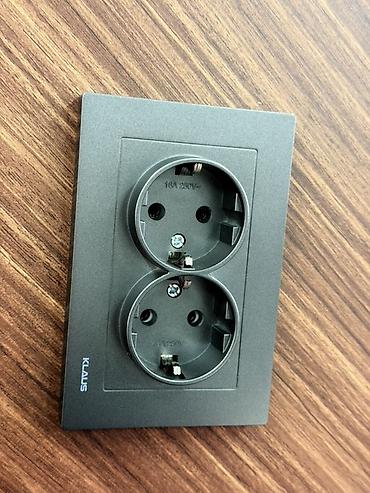 Выключатели: Настенные выключатели KLAUS, графитовый матовый цвет. Описание: - — 11