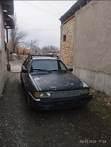 Легковой автомобиль в кузове универсал, тёмного цвета. Классический at lalafo.kg Легковой автомобиль в кузове универсал, тёмного цвета. Классический