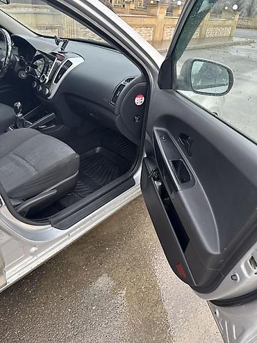 Kia: Kia Ceed: 1.6 l | 2009 il Universal — 13