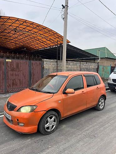 Mazda: Mazda Demio: 2004 г., 1.5 л, Автомат, Бензин — 1