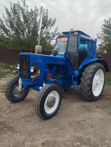 Traktorlar: BELARUS 80.1 təkərli traktor Xüsusiyyətlər: - Güclü dizel mühərrik — 7