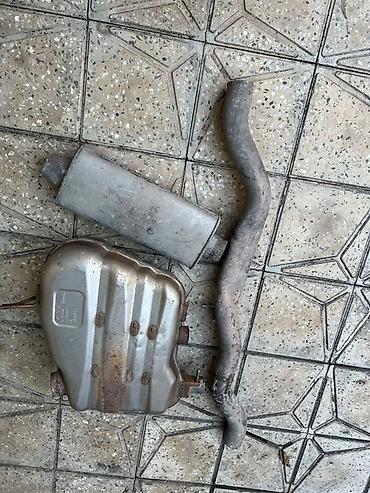 e46 katalizator: Avtomobil üçün egzoz sistemi hissələri Tərkib: - Səsboğucu (silindrik — 3