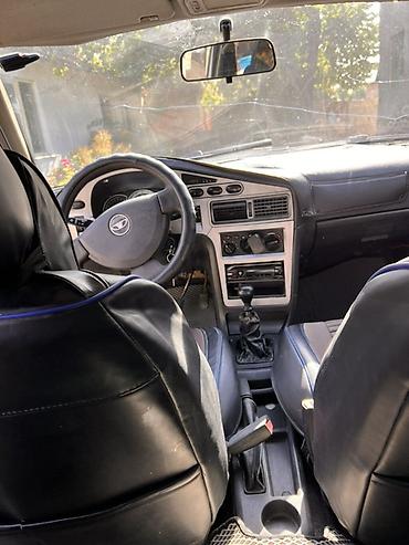 daewoo labo: Daewoo Nexia: 2010 г., Механика, Бензин, Седан — 8