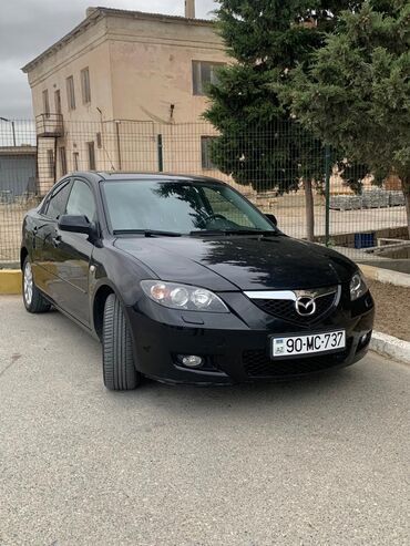 göbələk əleyhinə mazlar: Mazda 3: 2 l | 2009 il Sedan