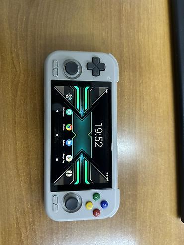 sony plastatyon: Портативная игровая консоль Retroid Pocket 4 (серый цвет) - Встроенная — 1