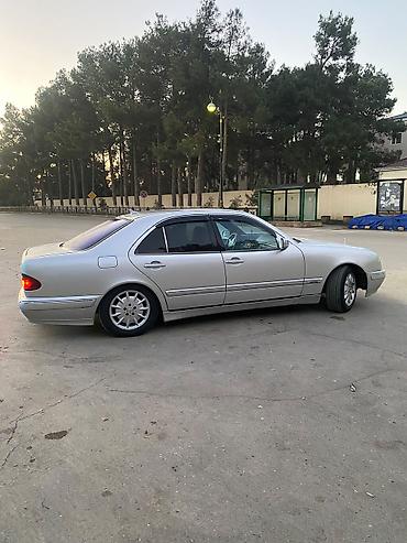 porsche satisi: Mercedes-Benz E-Class sedan (W210), gümüşü rəng. Xüsusiyyətlər: - — 5