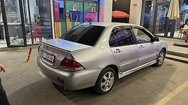 мотор на лансер: Mitsubishi Lancer: 2005 г., 1.6 л, Автомат, Бензин, Седан — 3