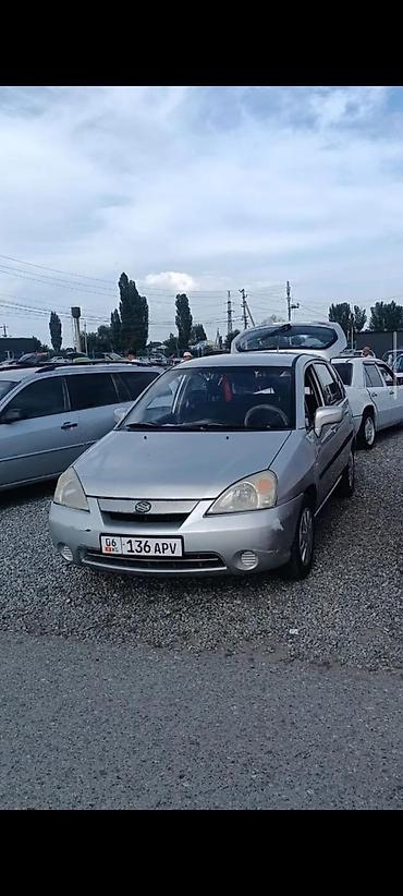 сузуки лиано: Suzuki Liana, серебристый хэтчбек/седан (KG номера 06 • 136 APV) — 1