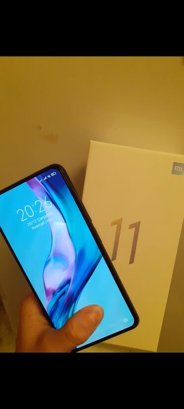 fly bl4237 телефон: Xiaomi Mi 11 Lite, 128 ГБ, цвет - Черный, 
 Отпечаток пальца, Две SIM карты, Face ID