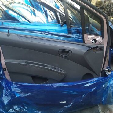 chevrolet colorado: Обшивка дверей Chevrolet Spark SPARK (M300) B10D1 1.0 DOHC 2011 перед