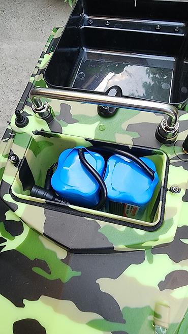 Аңчылык жана балык уулоо: Лодка для завоза прикормки в камуфляжной расцветке, оснащенная отсеком — 5