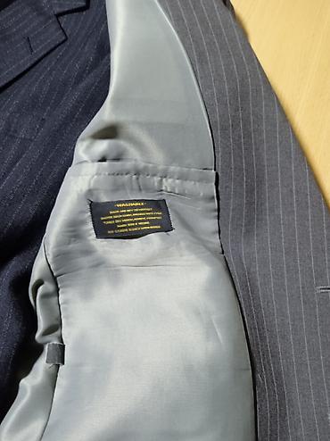 Костюмы: Мужская одежда: кожаная куртка‑парка и два классических костюма 1) — 7