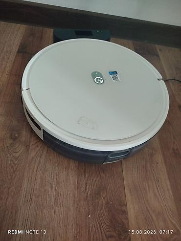 Robot tozsoran – dairəvi korpuslu, ağ rəngdə model. Şarj stansiyası — 1