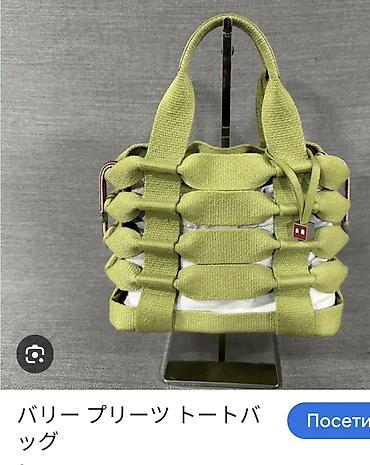 Torbe: BALLY prelepa torba sa prorezima. Dno je od kože kao i ručke, a torba — 11