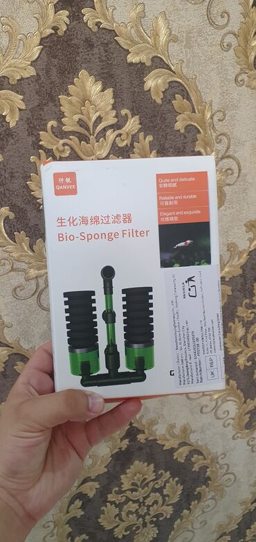 Akvarium aksessuar və ləvazimatları: Ağ rəngli silindrik korpusa malik akvarium xarici filtri. Qablaşdırma — 10