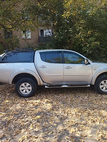 210 лупар: Mitsubishi L200: 2011 г., 2.5 л, Механика, Дизель, Пикап — 2