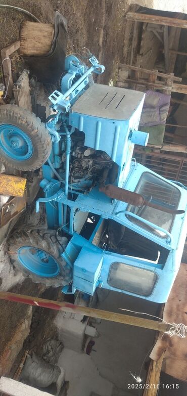 авто с последующим выкупом бишкек саната: Колёсный мини-трактор синего цвета с закрытой кабиной. Особенности и