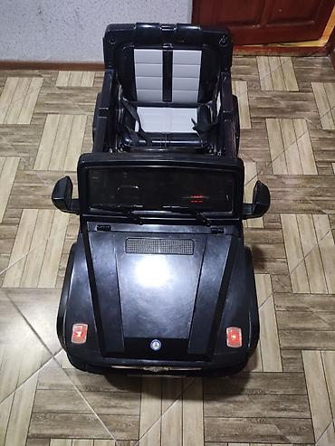 elektro muravey: Uşaq üçün elektrikli minik maşını – qara rəngdə, SUV/G-Class üslublu — 2