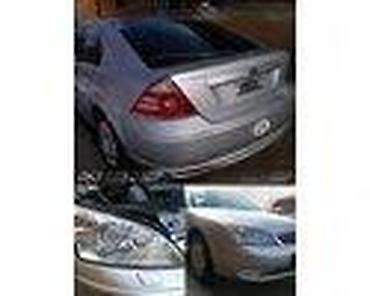 visina auta: KOCIONA KLESTA LIMUZINA ZA FORD MONDEO OD 2001. DO 2006. GOD. | FORD — 10