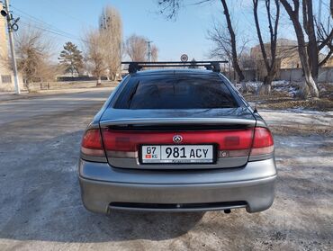 Mazda: Mazda Cronos: 1995 г., 1.8 л, Механика, Бензин, Хэтчбэк