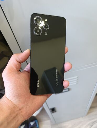 gence telfon: Redmi 12 Telfon səliqəli islənib adaptir var karopkasi yoxdu