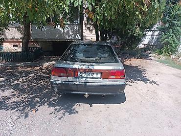 a4 b7: Isuzu Aska: 1990 г., Механика, Бензин, Лифтбек — 7