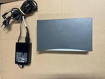 Modemi, ruteri i mrežni uređaji: HP ProCurve Switch 408 (model J4097C) - Mrežni preklopnik sa 8 Fast — 12