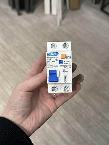 Дифференциальный автомат (УЗО-автомат) Chint NXBLE-63Y C25. Основные