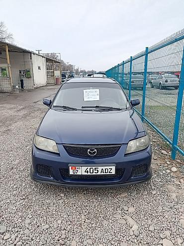 Mazda: Mazda 323: 2002 г., 1.6 л, Механика, Бензин, Хэтчбэк — 14