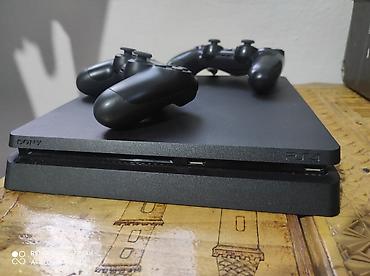 Sony PlayStation: PlayStation 4 Slim (PS4) — игровая консоль от Sony с двумя — 1
