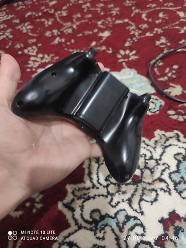 Xbox 360: Игровая консоль Xbox 360 (версия Slim/E) в черном корпусе. - Подходит — 18