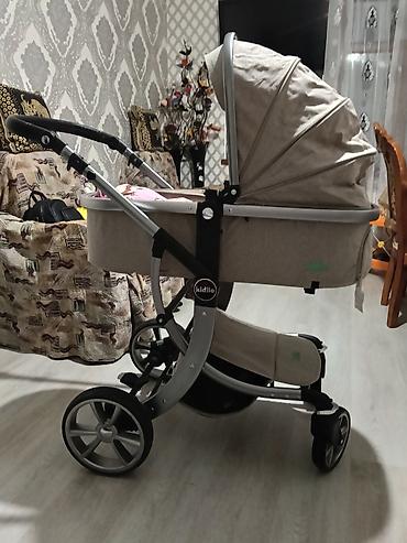 Uşaq dünyası: Uşaq arabası – Kidillo markası, bej rəng Xüsusiyyətlər: - 2-in-1 — 4